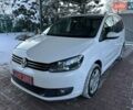 Белый Фольксваген Туран, объемом двигателя 1.4 л и пробегом 195 тыс. км за 9999 $, фото 1 на Automoto.ua