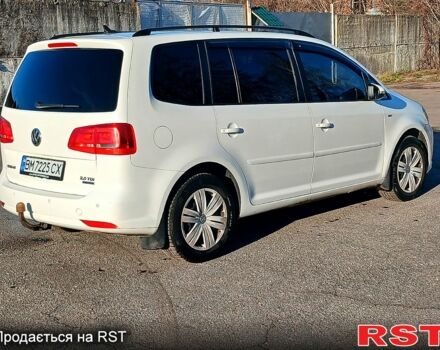 Білий Фольксваген Туран, об'ємом двигуна 2 л та пробігом 362 тис. км за 11700 $, фото 1 на Automoto.ua