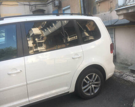 Белый Фольксваген Туран, объемом двигателя 1.39 л и пробегом 159 тыс. км за 10999 $, фото 2 на Automoto.ua