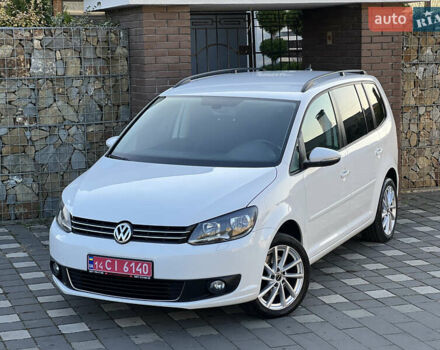 Белый Фольксваген Туран, объемом двигателя 1.4 л и пробегом 130 тыс. км за 9000 $, фото 1 на Automoto.ua
