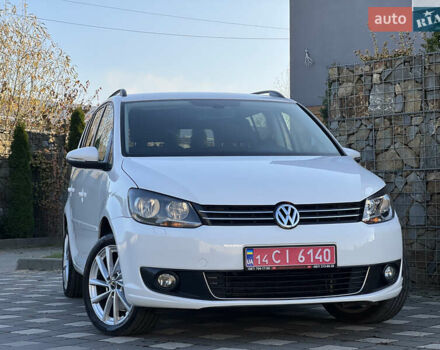 Белый Фольксваген Туран, объемом двигателя 1.4 л и пробегом 130 тыс. км за 8500 $, фото 1 на Automoto.ua