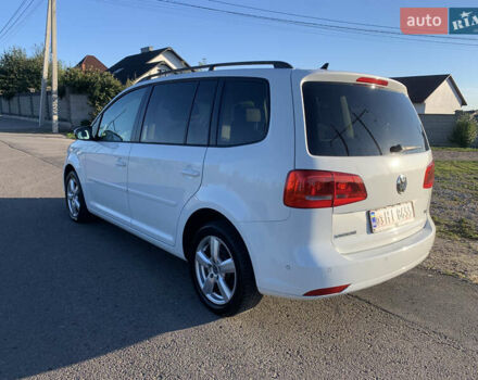 Белый Фольксваген Туран, объемом двигателя 1.4 л и пробегом 209 тыс. км за 9750 $, фото 1 на Automoto.ua