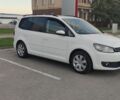 Білий Фольксваген Туран, об'ємом двигуна 1.97 л та пробігом 230 тис. км за 10700 $, фото 1 на Automoto.ua