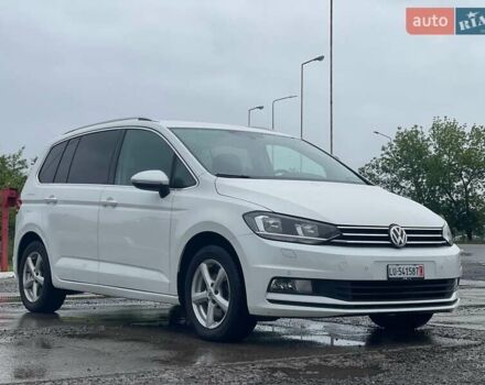 Белый Фольксваген Туран, объемом двигателя 1.4 л и пробегом 159 тыс. км за 15700 $, фото 2 на Automoto.ua