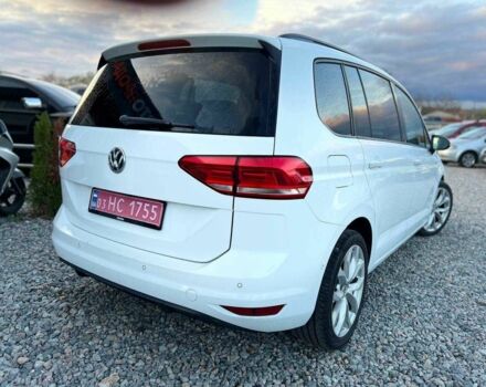 Белый Фольксваген Туран, объемом двигателя 2 л и пробегом 221 тыс. км за 14300 $, фото 1 на Automoto.ua