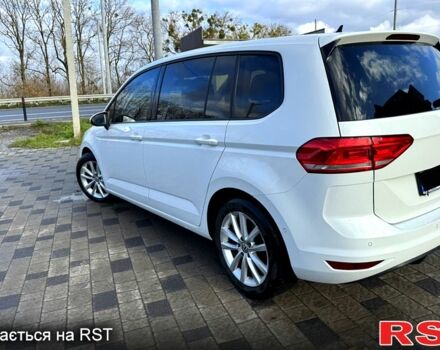 Білий Фольксваген Туран, об'ємом двигуна 2 л та пробігом 187 тис. км за 15500 $, фото 1 на Automoto.ua