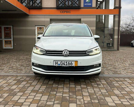 Білий Фольксваген Туран, об'ємом двигуна 2 л та пробігом 263 тис. км за 18700 $, фото 1 на Automoto.ua