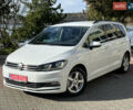 Белый Фольксваген Туран, объемом двигателя 2 л и пробегом 220 тыс. км за 17997 $, фото 1 на Automoto.ua