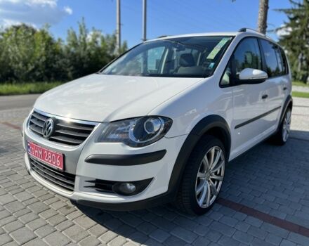 Белый Фольксваген Туран, объемом двигателя 1.4 л и пробегом 208 тыс. км за 6750 $, фото 1 на Automoto.ua