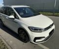 Білий Фольксваген Туран, об'ємом двигуна 1.5 л та пробігом 49 тис. км за 5600 $, фото 2 на Automoto.ua