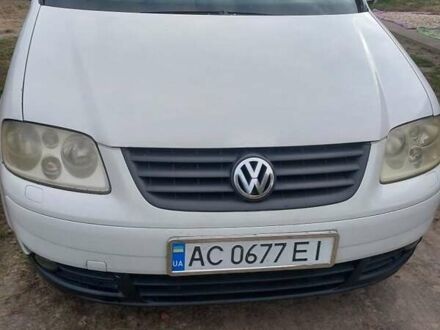 Белый Фольксваген Туран, объемом двигателя 1.9 л и пробегом 350 тыс. км за 4860 $, фото 1 на Automoto.ua