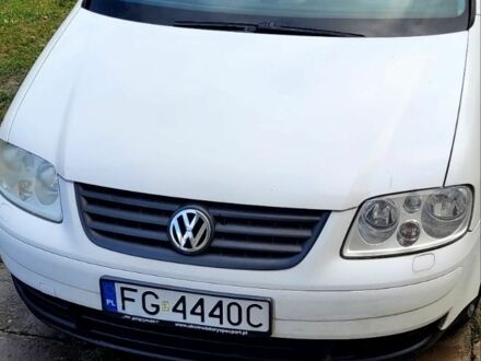 Белый Фольксваген Туран, объемом двигателя 2 л и пробегом 578 тыс. км за 2000 $, фото 1 на Automoto.ua
