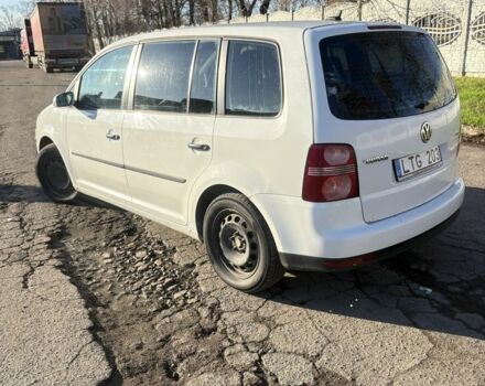 Белый Фольксваген Туран, объемом двигателя 1.9 л и пробегом 431 тыс. км за 2900 $, фото 1 на Automoto.ua