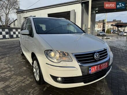 Белый Фольксваген Туран, объемом двигателя 1.4 л и пробегом 210 тыс. км за 6750 $, фото 1 на Automoto.ua