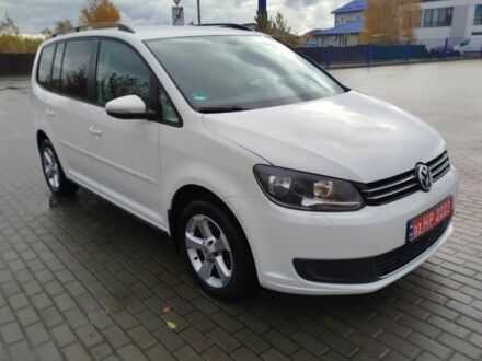 Белый Фольксваген Туран, объемом двигателя 1.4 л и пробегом 238 тыс. км за 8600 $, фото 1 на Automoto.ua