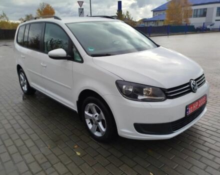 Белый Фольксваген Туран, объемом двигателя 1.4 л и пробегом 238 тыс. км за 8600 $, фото 1 на Automoto.ua