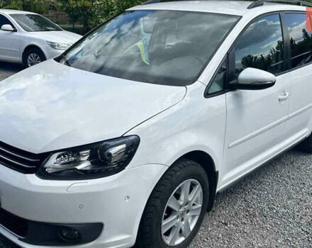 Білий Фольксваген Туран, об'ємом двигуна 1.39 л та пробігом 258 тис. км за 7000 $, фото 1 на Automoto.ua