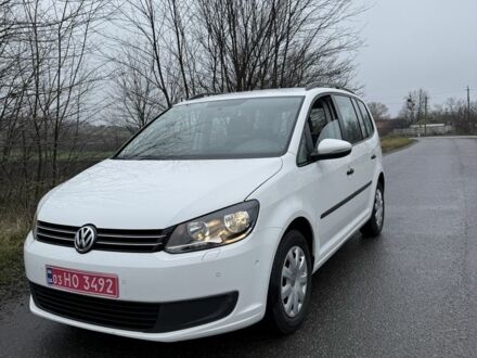 Белый Фольксваген Туран, объемом двигателя 1.4 л и пробегом 223 тыс. км за 9499 $, фото 1 на Automoto.ua
