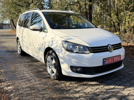 Белый Фольксваген Туран, объемом двигателя 1.4 л и пробегом 161 тыс. км за 11900 $, фото 1 на Automoto.ua