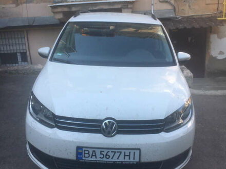 Белый Фольксваген Туран, объемом двигателя 1.39 л и пробегом 159 тыс. км за 10999 $, фото 1 на Automoto.ua