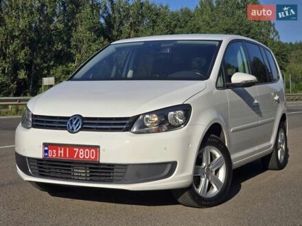 Білий Фольксваген Туран, об'ємом двигуна 2 л та пробігом 250 тис. км за 10999 $, фото 1 на Automoto.ua
