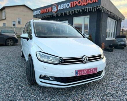 Білий Фольксваген Туран, об'ємом двигуна 2 л та пробігом 221 тис. км за 14300 $, фото 1 на Automoto.ua