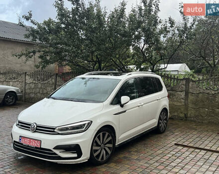 Білий Фольксваген Туран, об'ємом двигуна 1.98 л та пробігом 250 тис. км за 17500 $, фото 1 на Automoto.ua