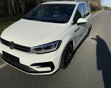 Белый Фольксваген Туран, объемом двигателя 1.5 л и пробегом 49 тыс. км за 5600 $, фото 1 на Automoto.ua