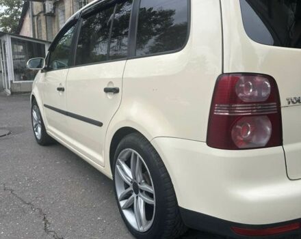 Бежевый Фольксваген Туран, объемом двигателя 1.9 л и пробегом 320 тыс. км за 6800 $, фото 2 на Automoto.ua