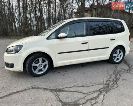 Бежевий Фольксваген Туран, об'ємом двигуна 2 л та пробігом 349 тис. км за 10500 $, фото 2 на Automoto.ua