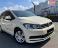 Бежевый Фольксваген Туран, объемом двигателя 1.97 л и пробегом 323 тыс. км за 11800 $, фото 1 на Automoto.ua