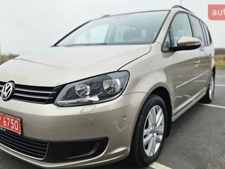 Бежевый Фольксваген Туран, объемом двигателя 2 л и пробегом 205 тыс. км за 12750 $, фото 1 на Automoto.ua