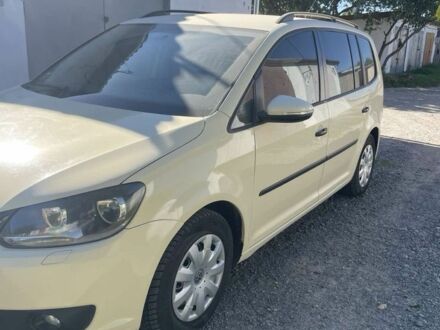 Бежевый Фольксваген Туран, объемом двигателя 2 л и пробегом 243 тыс. км за 9500 $, фото 1 на Automoto.ua