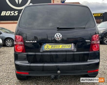 Черный Фольксваген Туран, объемом двигателя 1.9 л и пробегом 332 тыс. км за 6999 $, фото 4 на Automoto.ua