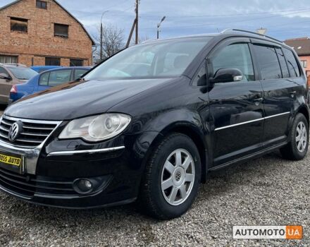 Черный Фольксваген Туран, объемом двигателя 1.9 л и пробегом 332 тыс. км за 6999 $, фото 2 на Automoto.ua