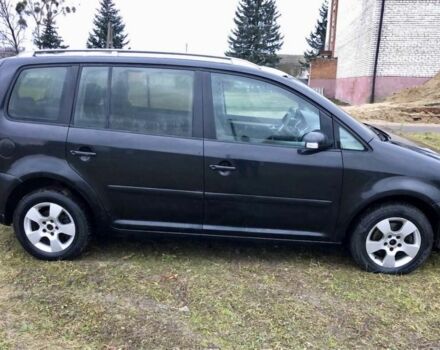 Черный Фольксваген Туран, объемом двигателя 2 л и пробегом 400 тыс. км за 4999 $, фото 3 на Automoto.ua