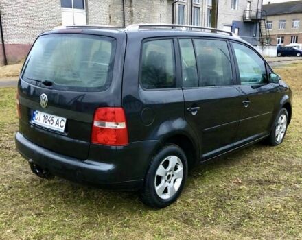 Черный Фольксваген Туран, объемом двигателя 2 л и пробегом 400 тыс. км за 4999 $, фото 5 на Automoto.ua