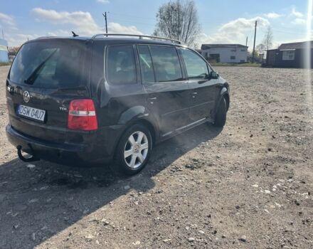 Черный Фольксваген Туран, объемом двигателя 2 л и пробегом 250 тыс. км за 2500 $, фото 5 на Automoto.ua