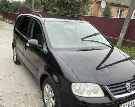Черный Фольксваген Туран, объемом двигателя 1.6 л и пробегом 235 тыс. км за 6500 $, фото 3 на Automoto.ua