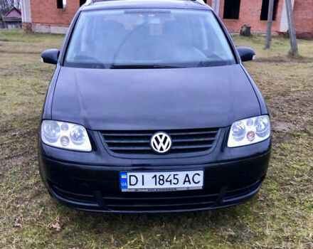 Черный Фольксваген Туран, объемом двигателя 1.97 л и пробегом 400 тыс. км за 4999 $, фото 2 на Automoto.ua
