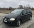 Черный Фольксваген Туран, объемом двигателя 2 л и пробегом 236 тыс. км за 5100 $, фото 1 на Automoto.ua