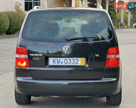 Черный Фольксваген Туран, объемом двигателя 1.6 л и пробегом 192 тыс. км за 4900 $, фото 5 на Automoto.ua