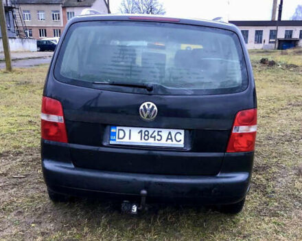 Черный Фольксваген Туран, объемом двигателя 1.97 л и пробегом 400 тыс. км за 4999 $, фото 5 на Automoto.ua