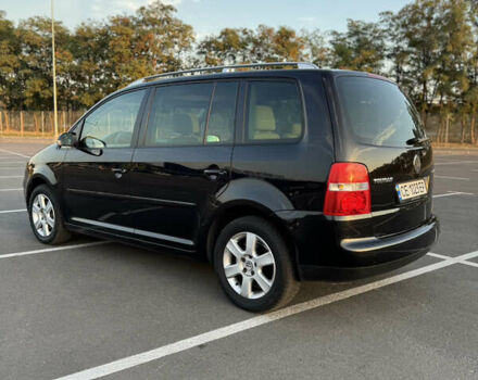 Черный Фольксваген Туран, объемом двигателя 1.6 л и пробегом 253 тыс. км за 5500 $, фото 18 на Automoto.ua