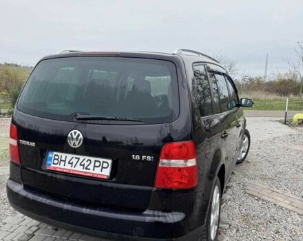 Черный Фольксваген Туран, объемом двигателя 1.6 л и пробегом 264 тыс. км за 5000 $, фото 4 на Automoto.ua