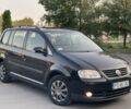 Чорний Фольксваген Туран, об'ємом двигуна 1.9 л та пробігом 300 тис. км за 2650 $, фото 1 на Automoto.ua