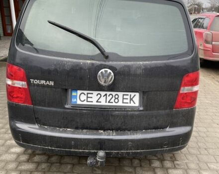 Черный Фольксваген Туран, объемом двигателя 1.6 л и пробегом 229 тыс. км за 4650 $, фото 2 на Automoto.ua