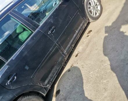 Черный Фольксваген Туран, объемом двигателя 1.6 л и пробегом 218 тыс. км за 5600 $, фото 2 на Automoto.ua