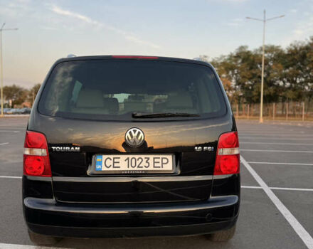 Черный Фольксваген Туран, объемом двигателя 1.6 л и пробегом 253 тыс. км за 5500 $, фото 12 на Automoto.ua