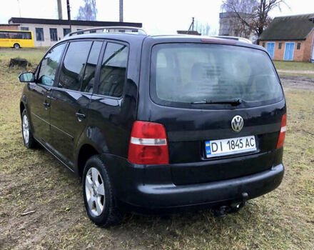Черный Фольксваген Туран, объемом двигателя 1.97 л и пробегом 400 тыс. км за 4999 $, фото 6 на Automoto.ua